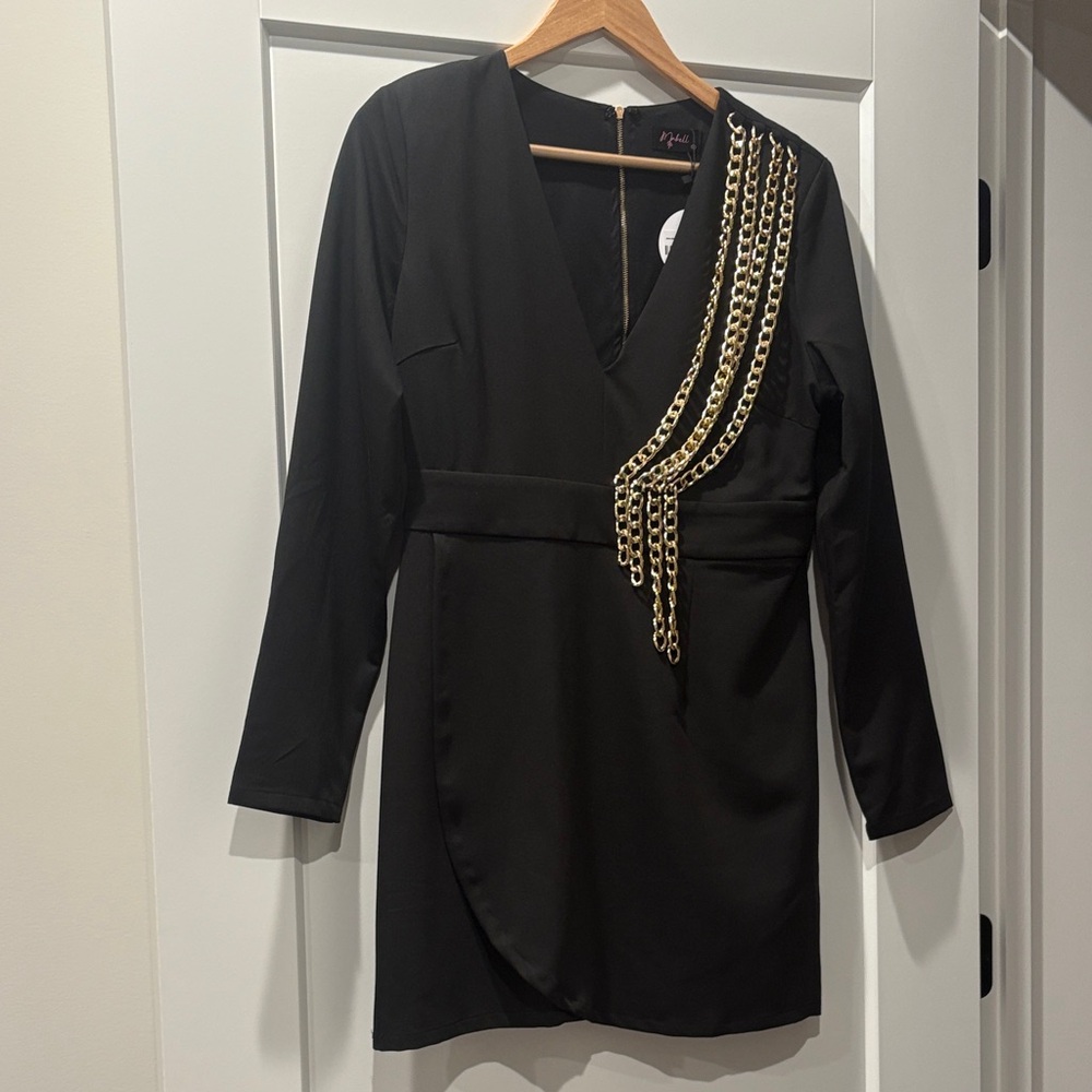 Elegant Black Dress with Gold Chain Detail